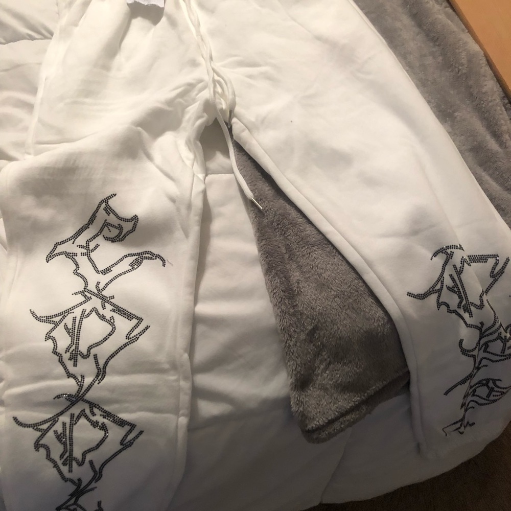 Adika sweatpants.   New with tags